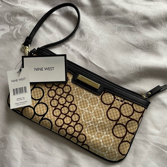 Nine West Handbags - NWT Nine West  Wristlet Beautiful color combination a unique piece